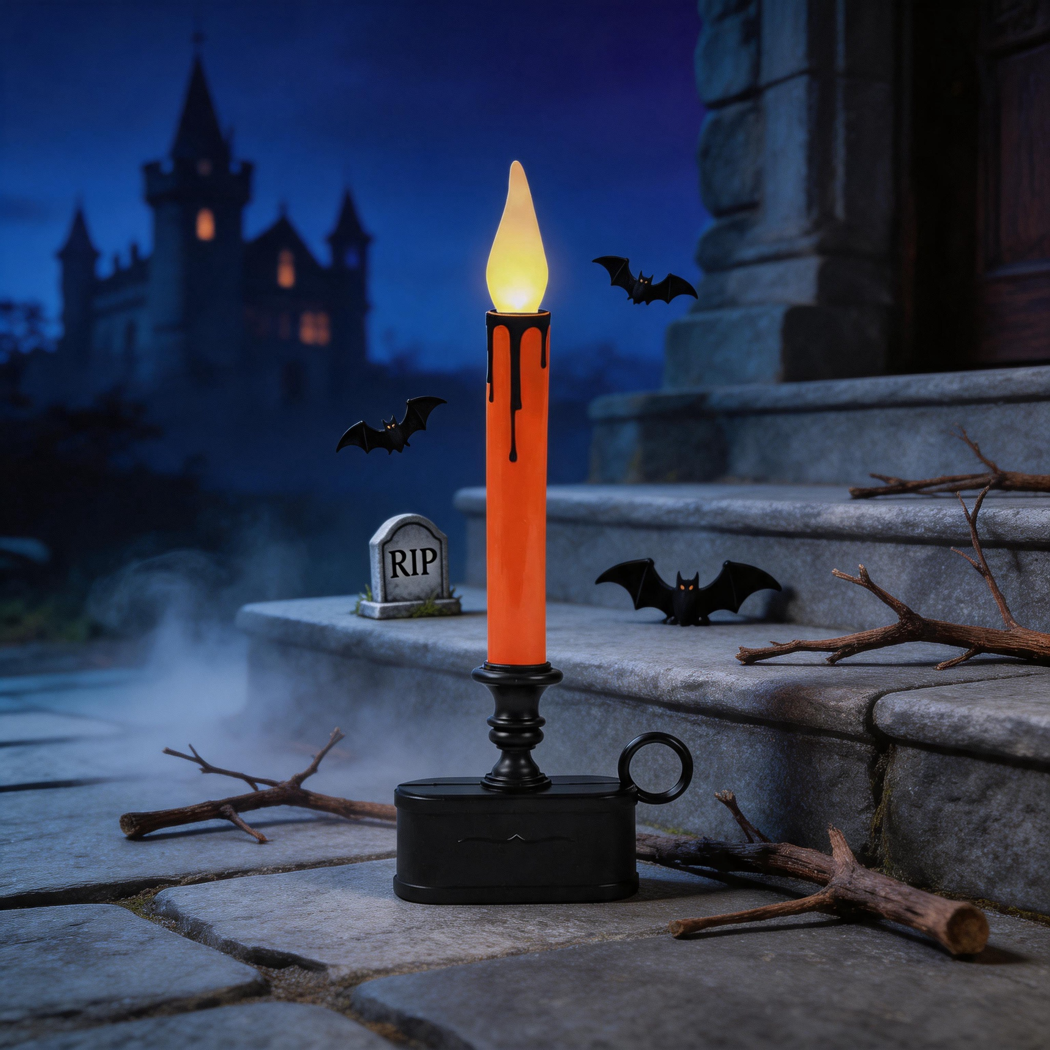 LED taper candle orange black placed on stone porch Halloween scene